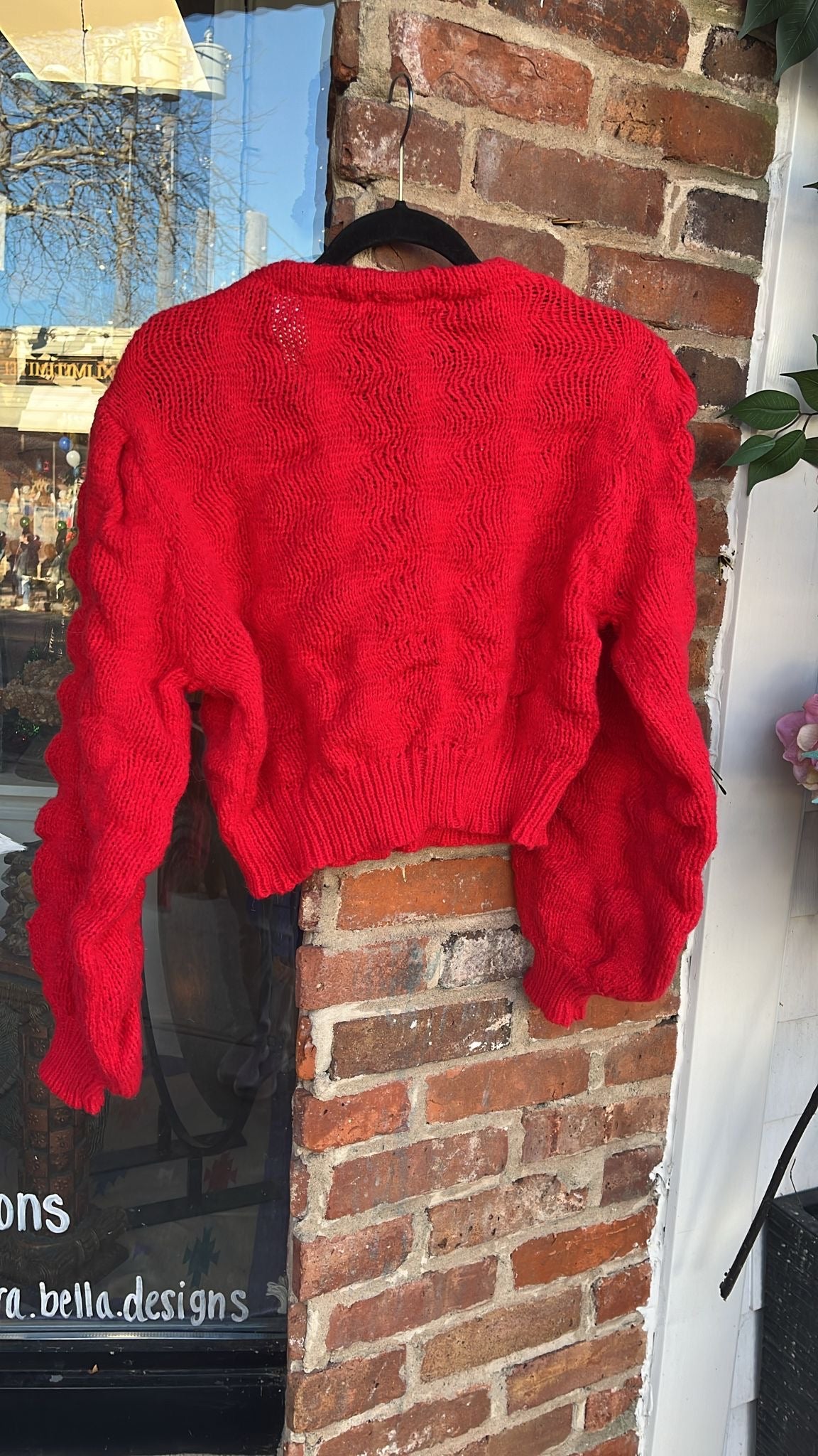 Red Cardigan with Knitted Rose Buttons.